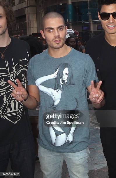 Singer Max George of The Wanted rings the closing bell at the NASDAQ MarketSite on May 31, 2013 in New York City.