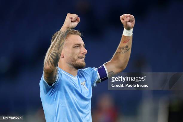 Ciro Immobile of Lazio celebrates after scoring their sides first goal from the penalty spot during the Serie A TIM match between SS Lazio and AC...