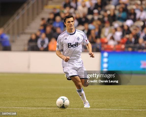 Alain Rochat Alain Rochat of the Vancouver Whitecaps runs against the Montreal ...