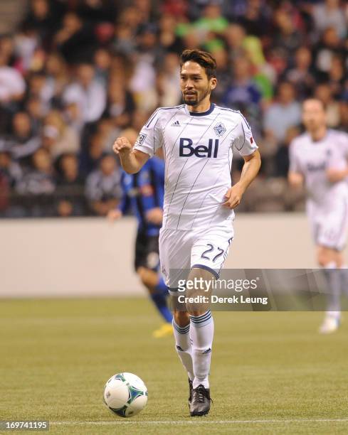 Jun Marques Davidson of the Vancouver Whitecaps runs against the Montreal Impact during the finals of the Amway Canadian Championship at B.C. Place...