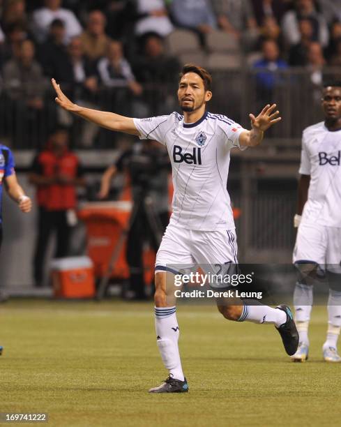 Jun Marques Davidson of the Vancouver Whitecaps runs against the Montreal Impact during the finals of the Amway Canadian Championship at B.C. Place...