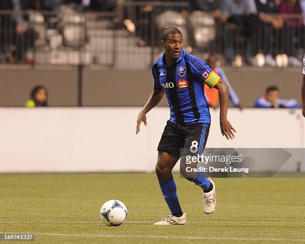 Patrice Bernier of the Montreal Impact runs against the Vancouver Whitecaps during the finals of the Amway Canadian Championship at B.C. Place on May...