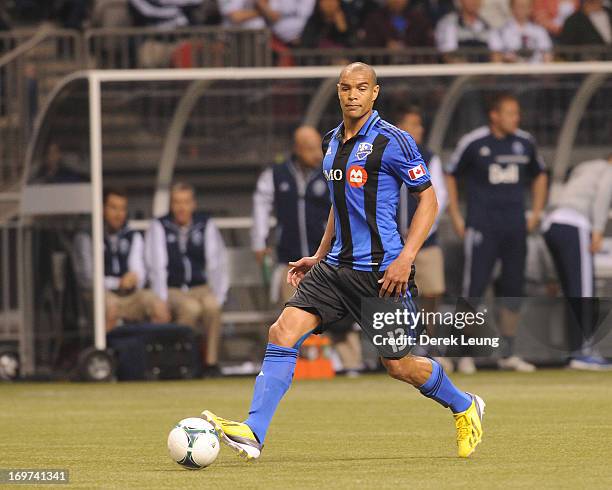 Matteo Ferrari of the Montreal Impact runs against the Vancouver Whitecaps during the finals of the Amway Canadian Championship at B.C. Place on May...