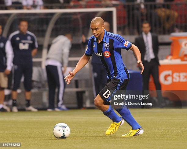 Matteo Ferrari of the Montreal Impact runs against the Vancouver Whitecaps during the finals of the Amway Canadian Championship at B.C. Place on May...