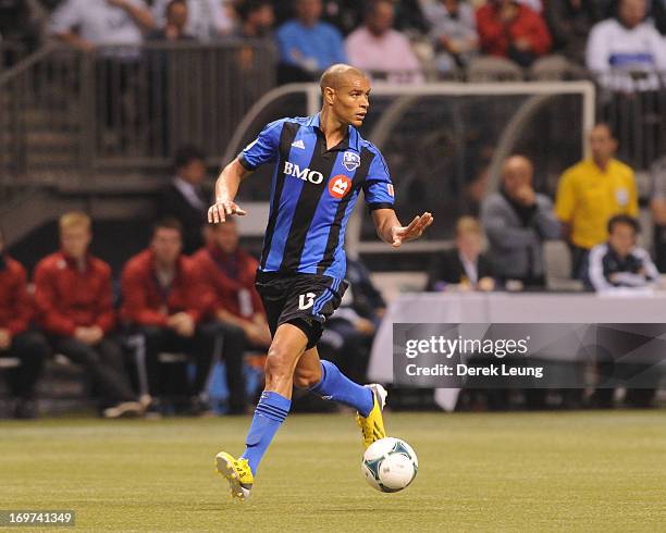 Matteo Ferrari of the Montreal Impact runs against the Vancouver Whitecaps during the finals of the Amway Canadian Championship at B.C. Place on May...