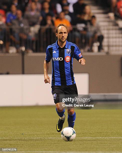 Justin Mapp of the Montreal Impact runs against the Vancouver Whitecaps during the finals of the Amway Canadian Championship at B.C. Place on May 29,...