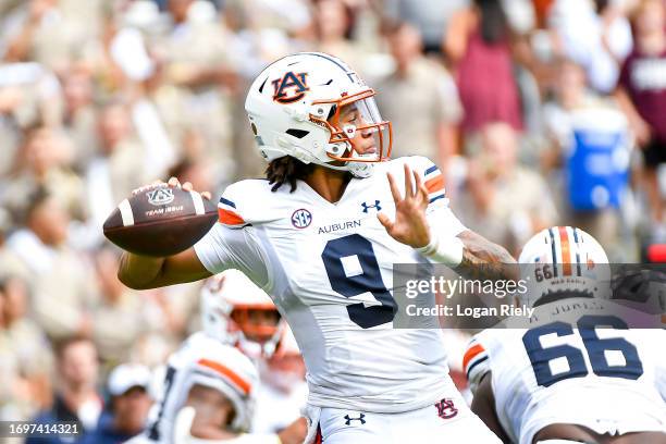 Quarterback Robby Ashford of the Auburn Tigers passes the ball in the second half against the Texas A&M Aggies at Kyle Field on September 23, 2023 in...