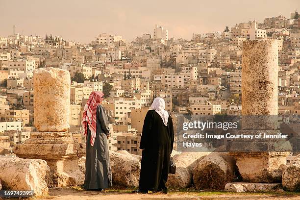 jordanians look out over amman - アンマン市 ストックフォトと画像