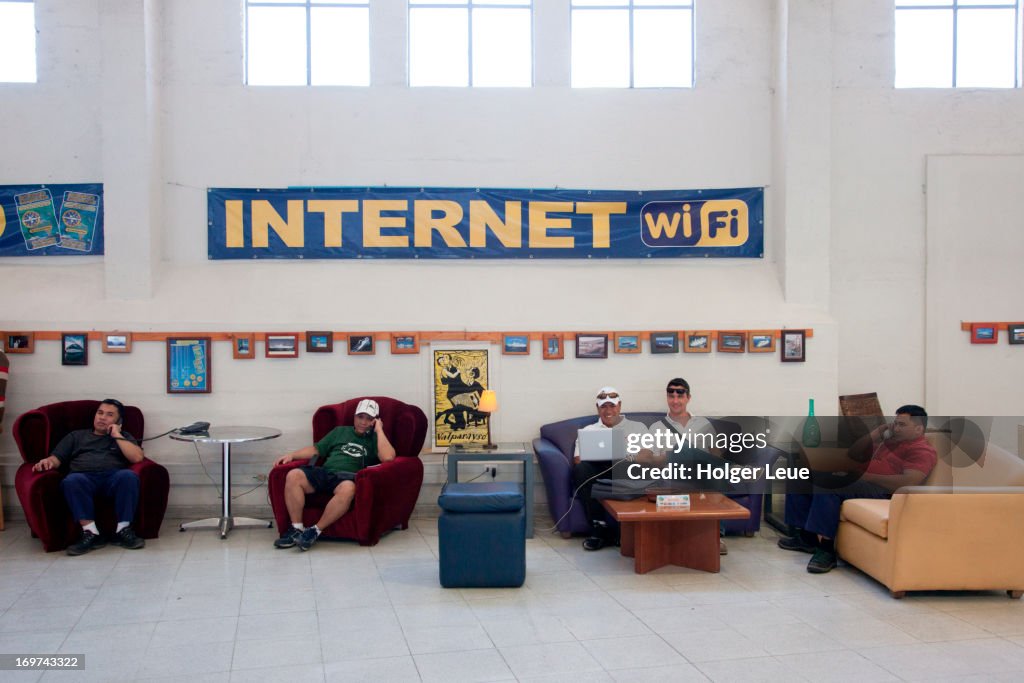 Crew members of cruise ship use internet and Wi-Fi