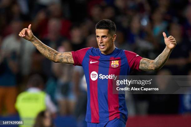 Joao Cancelo of FC Barcelona celebrates after scoring his team's second goal during the LaLiga EA Sports match between FC Barcelona and RC Celta at...