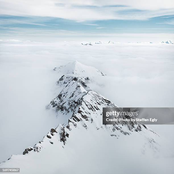 high fog alps - switzerland winter stock pictures, royalty-free photos & images