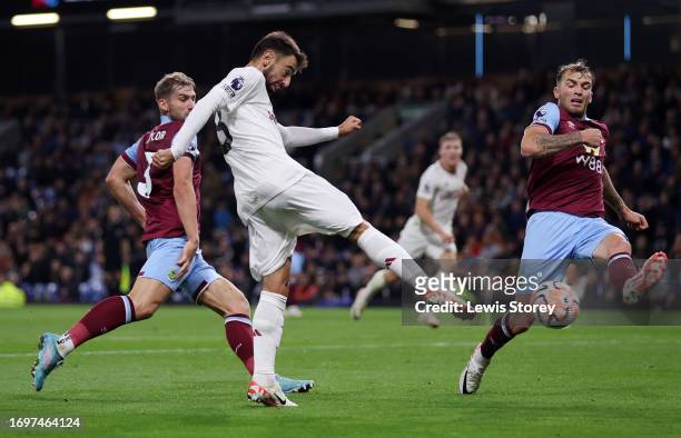 Bruno Fernandes of Manchester United scores their sides first goal during the Premier League match between Burnley FC and Manchester United at Turf...