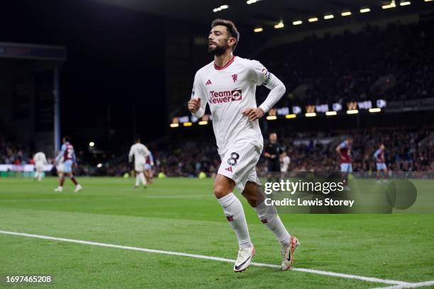 Bruno Fernandes of Manchester United celebrates after scoring their sides first goal during the Premier League match between Burnley FC and...