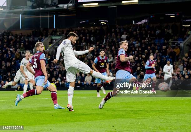 Bruno Fernandes of Manchester United scores their first goal during the Premier League match between Burnley FC and Manchester United at Turf Moor on...