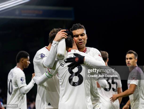 Bruno Fernandes of Manchester United celebrates scoring their first goal during the Premier League match between Burnley FC and Manchester United at...