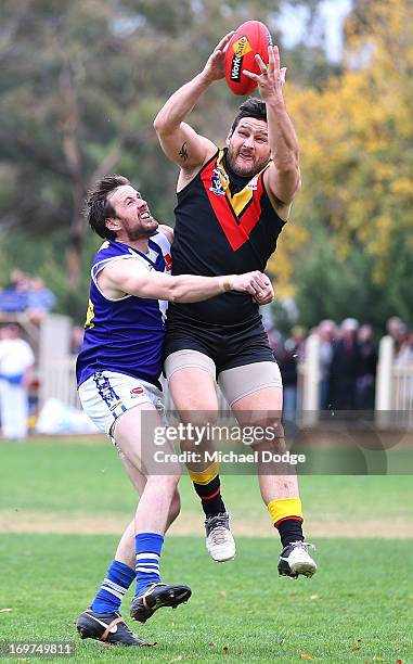 Brendan Fevola of Bacchus Marsh marks the ball during the round six BFL match between Bacchus Marsh and Sunbury at Maddingley Park on June 1, 2013 in...