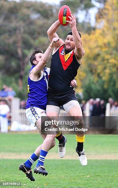 Brendan Fevola of Bacchus Marsh marks the ball during the round six BFL match between Bacchus Marsh and Sunbury at Maddingley Park on June 1, 2013 in...