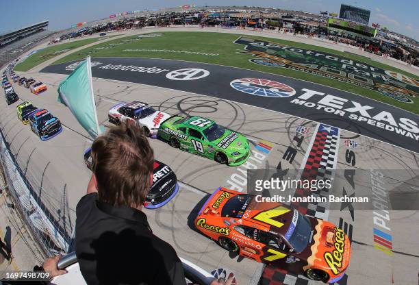 Justin Allgaier, driver of the Reese's Ice Cream/Sam's Club Chevrolet, leads the field to the green flag to start the NASCAR Xfinity Series Andy's...