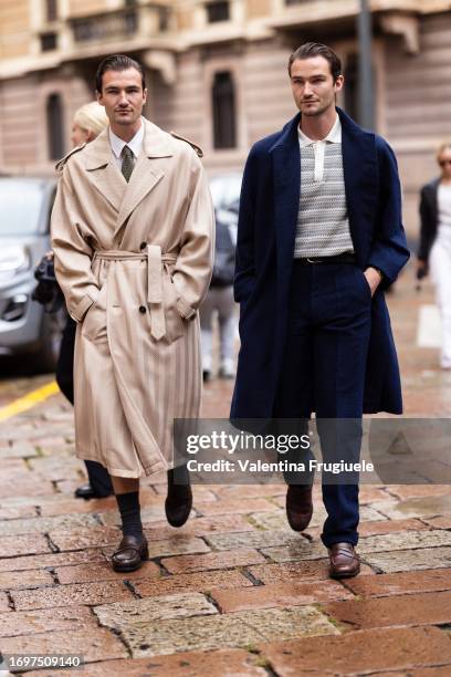 Brett Staniland and Scott Staniland are seen wearing a beige coat and blue suit over a Missoni polo shirt outside the Missoni show during Milan...