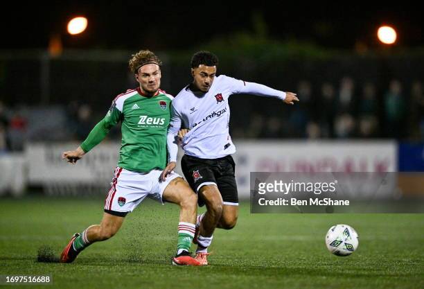 Louth , Ireland - 25 September 2023; Sam Durrant of Dundalk and Ben Worman of Cork City during the SSE Airtricity Men's Premier Division match...