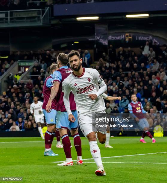 Bruno Fernandes of Manchester United celebrates scoring their first goal during the Premier League match between Burnley FC and Manchester United at...