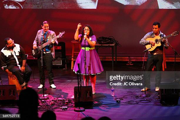 Members of the band La Santa Cecilia perform on stage during Sonic Overdrive: Songs and Stories through the streets of Los Angeles at J. Paul Getty...
