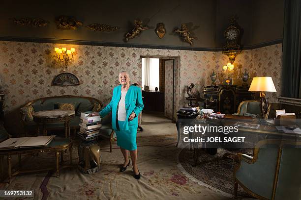 Helene Martini, nicknamed the "Empress of the night", who overlooked 17 cabarets and directed the 'Folies Bergeres' cabaret for 37 years, poses for a...