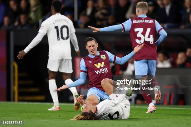 Connor Roberts of Burnley reacts as Hannibal Mejbri of Manchester United lays injured during the Premier League match between Burnley FC and...