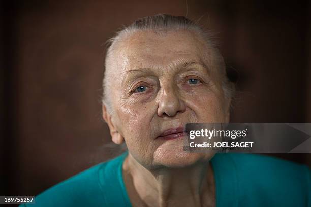 Helene Martini, nicknamed the "Empress of the night", who overlooked 17 cabarets and directed the 'Folies Bergeres' cabaret for 37 years, poses for a...