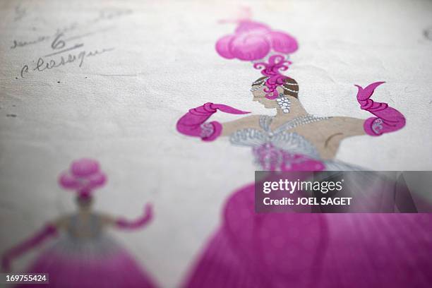 Picture taken in Paris, on May 31 shows the 1958 "Danseuses pour un finale" drawing by Franco-Russian artist Romain de Tirtoff, also known as 'Erte'....