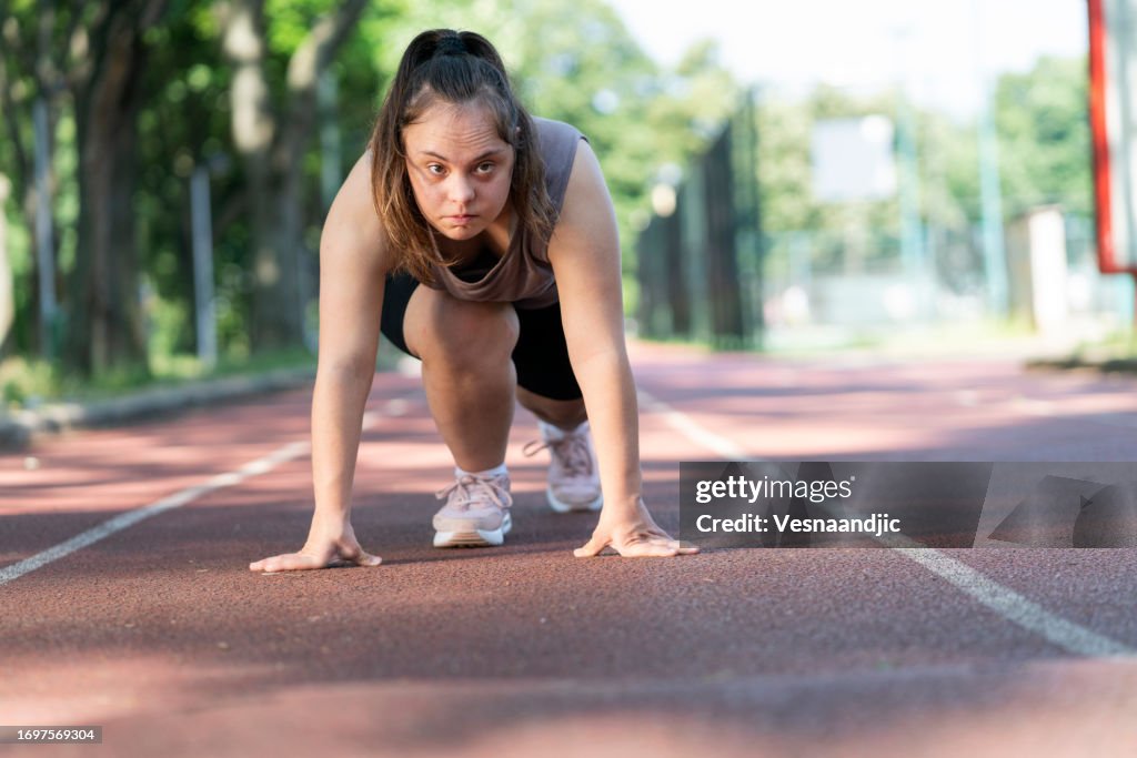 Young woman with Down Syndrome exercise