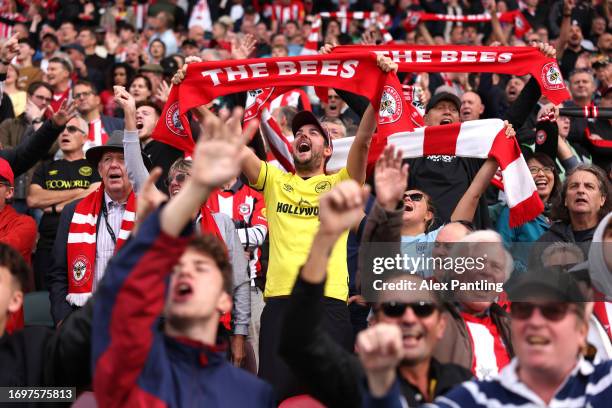 Brentford fans show their support during the Premier League match between Brentford FC and Everton FC at Brentford Community Stadium on September 23,...