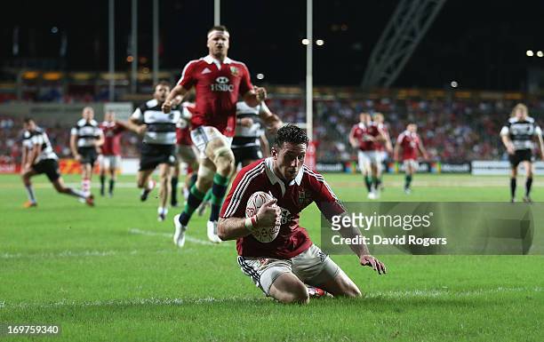 Alex Cuthbert of the Lions scores his second try during the match between the British & Irish Lions and the Barbarians at Hong Kong Stadium on June 1...