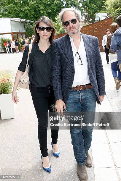Actress Geraldine Pailhas and husband Christopher Thompson attend Roland Garros Tennis French Open 2013 - Day 7 on June 1, 2013 in Paris, France.