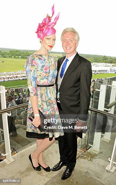 Jade Parfitt and Philip Treacy attend Derby Day at the Investec Derby Festival at Epsom Racecourse on June 1, 2013 in Epsom, United Kingdom.