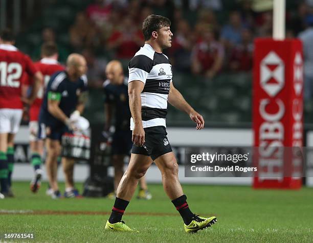 Schalk Brits the Barbarians hooker walks off the field after being shown the yellow card for striking Owen Farrell during the match between the...