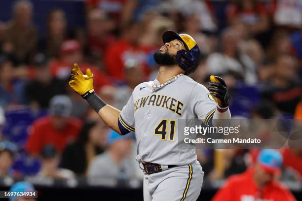 Carlos Santana of the Milwaukee Brewers celebrates hitting a three run home run during the sixth inning against the Miami Marlins at loanDepot park...