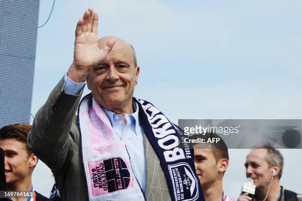 Bordeaux mayor Alain Juppe waves at supporters, in Bordeaux, on June 1 during a celebration of the Girondins de Bordeaux's victory in the French Cup...