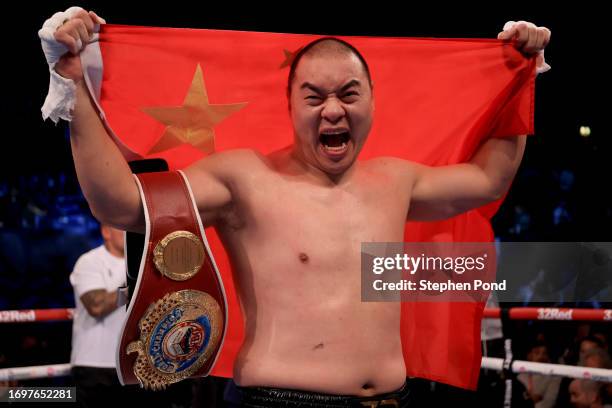 Zhilei Zhang celebrates after winning his fight against Joe Joyce during the WBO Interim World Heavyweight Title fight between Zhilei Zhang and Joe...