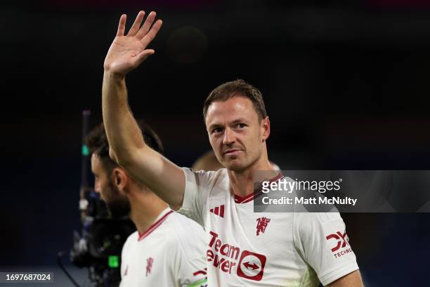 Jonny Evans of Manchester United waves to the fans at full time during the Premier League match between Burnley FC and Manchester United at Turf Moor...