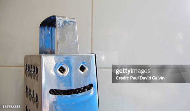 cheese grater smiling - anthropomorphic stock pictures, royalty-free photos & images