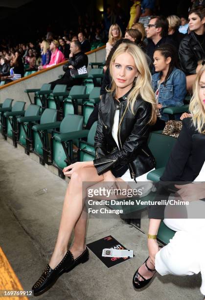 Poppy Delevingne poses inside the Royal Box at the "Chime For Change: The Sound Of Change Live" Concert at Twickenham Stadium on June 1, 2013 in...