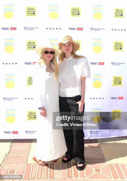 Dakota Fanning and Elle Fanning attend LA Loves Alex's Lemonade 2023 at UCLA Royce Quad on September 23, 2023 in Los Angeles, California.
