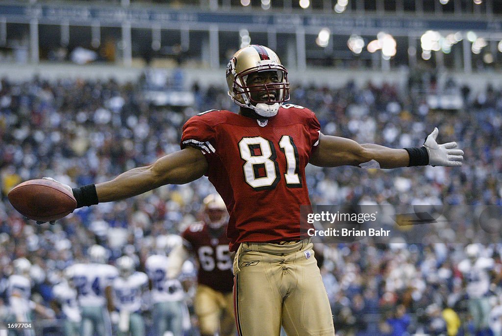 Owens celebrates a touchdown