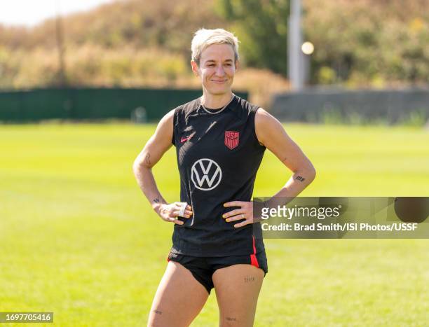 Megan Rapinoe of the United States stands in the huddle during her last USWNT training at SeatGeek Stadium practice field on September 23, 2023 in...