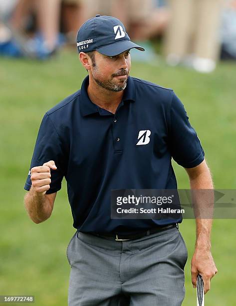 Matt Kuchar celebrates his birdie putt on the 14th hole during the third round of the Memorial Tournament presented by Nationwide Insurance at...