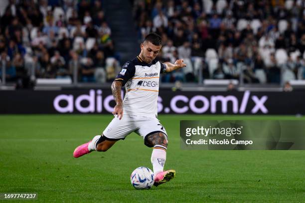 Gabriel Strefezza of US Lecce kicks the ball during the Serie A football match between Juventus FC and US Lecce. Juventus FC won 1-0 over US Lecce.