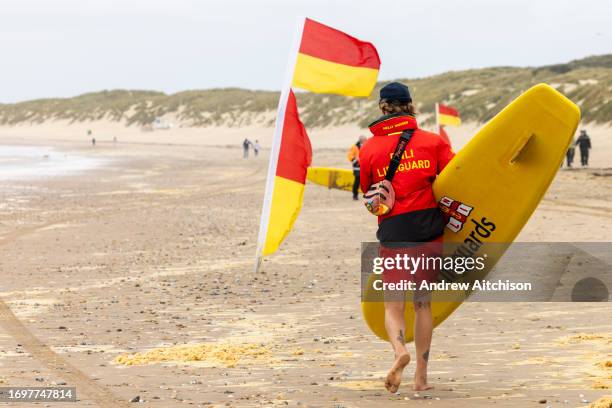 Beach lifeguards taking part in a South East Coast Ambulance Service organised simulated emergency situation on Camber Sands on the 28th of September...