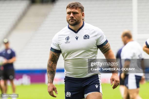 Scotland's tighthead prop Rory Sutherland takes part in the captain's run training session at Pierre-Mauroy stadium in Villeneuve-d'Ascq near Lille,...