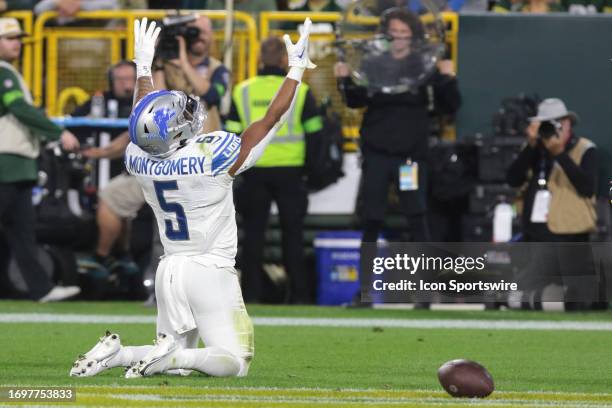 Detroit Lions running back David Montgomery celebrates his touchdown during a game between the Green Bay Packers and the Detroit Lions on September...